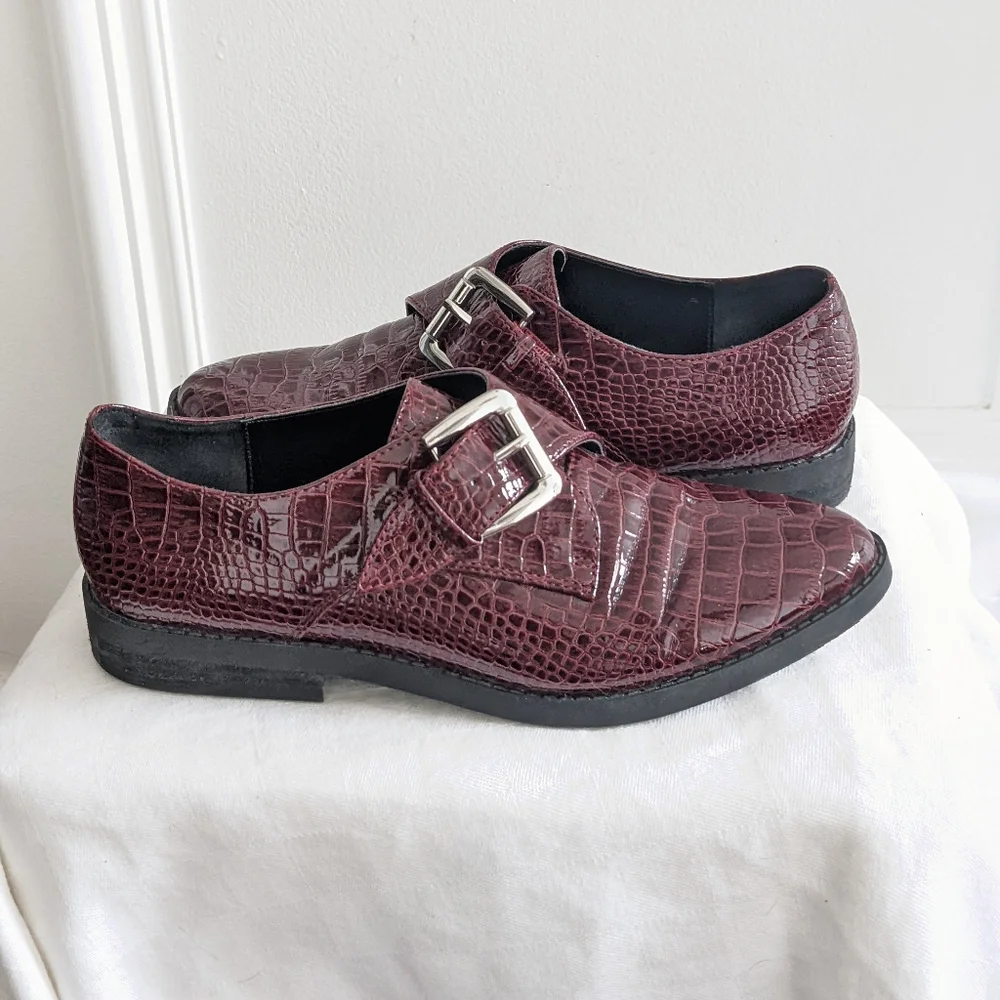 Patent leather loafers by Aldo